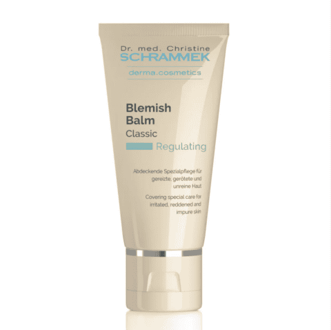 A beige squeeze tube labeled "Dr. med. Christine Schrammek Blemish Balm Classic" stands upright against a white background.